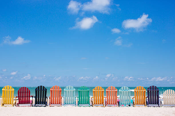 Beautiful color chairs on the beach on the summer vacation